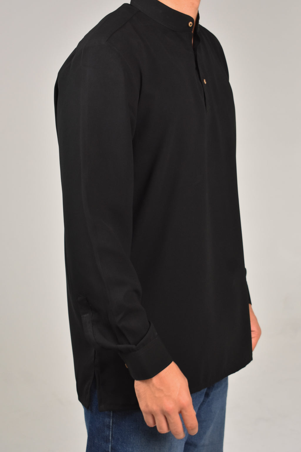 Rawi Short Kurta in Smooth Finish, Black, angled side view worn with jeans